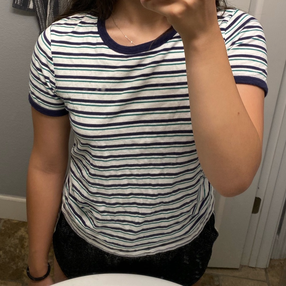 White tee with blue and green stripes